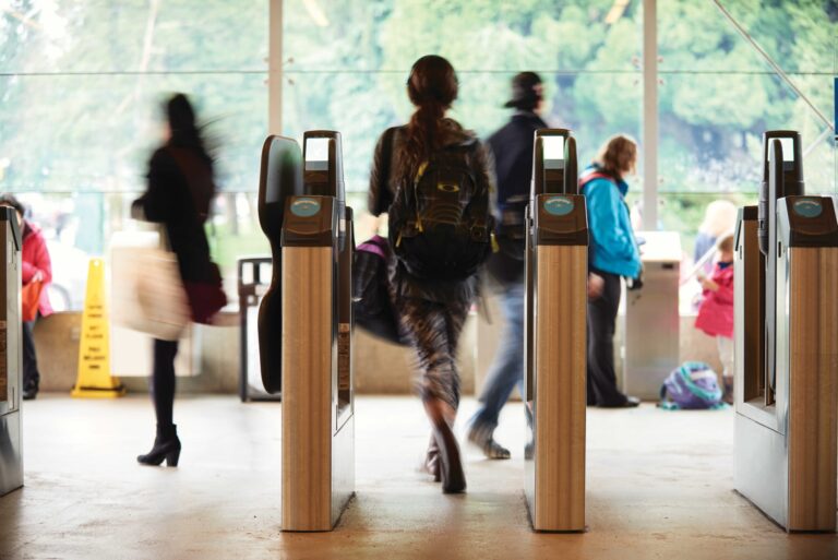 People entering SkyTrain station near Ashleigh Oakridge Vancouver showing convenient transit access
