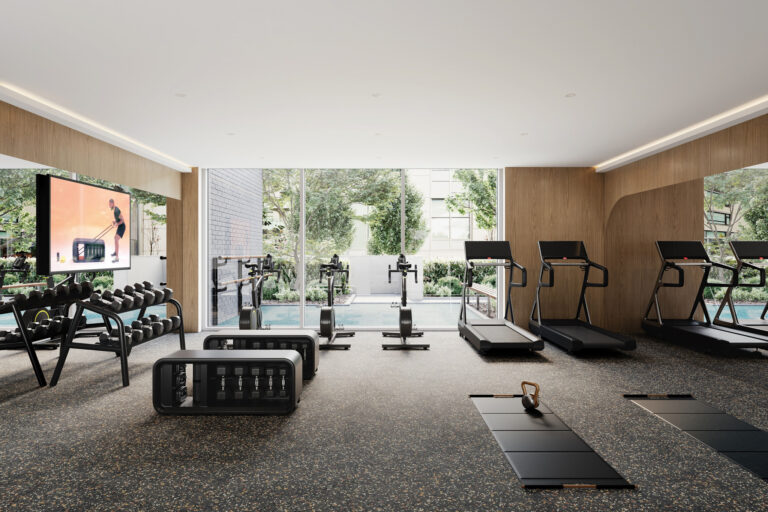 Modern condo fitness centre with gym equipment in Oakridge Vancouver
